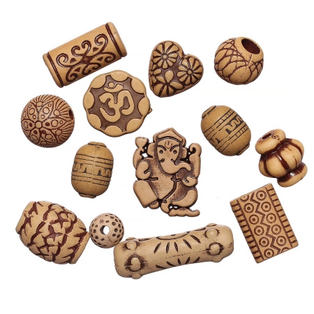 <p>
Набор акриловых бусин, могут попадаться небольшие подвесочки. Имитация резьбы по кости. Бусины и подвески могут отличаться от представленных на фотографии. Цена за набор из 10 грамм (около 12-25 штук в зависимости от размера). Фасуются без проверки на дефекты и без подбора по цвету, форме, размеру.
</p><p>ВНИМАНИЕ: наборы поставляются двух типов, см. фотографии.</p>