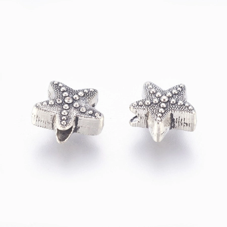 <p>Металлическая бусина в форме морской звезды, под античное серебро. Чернение может быть менее насыщенное, чем на фотографии. Оттенок может немного отличаться от фотографии. Диаметр отверстия около 2 мм. Цена за 10 грамм (около 9 бусин, фасуются без проверки на дефекты).</p>