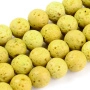 <p>Бусины из натуральной вулканической лавы (вулканического туфа), тонированной в желтый цвет. Оттенок может отличаться от фотографии. Бусины матовые. Могут немного отличаться по форме и размеру. Цена за низку, около 63 бусин. Бусины могут быть покрыты пылью от сверления, рекомендуется их протереть или промыть перед использованием.</p>