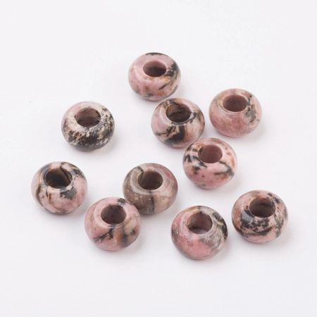 <p>Бусины - рондели с крупным отверстием (абакусы, диски) из натурального камня - родонита. Диаметр отверстия около 6 мм. Эти бусины отлично подходят для браслетов в стиле Пандора, а также для сборки украшений с кожаными шнурами. Бусины могут немного отличаться по форме и размеру. Оттенок может отличаться от фотографии: есть бусины светло-розовые, есть с большим количеством черных полос, есть бежево-черные и т.д. Цена за 2 бусины.</p>