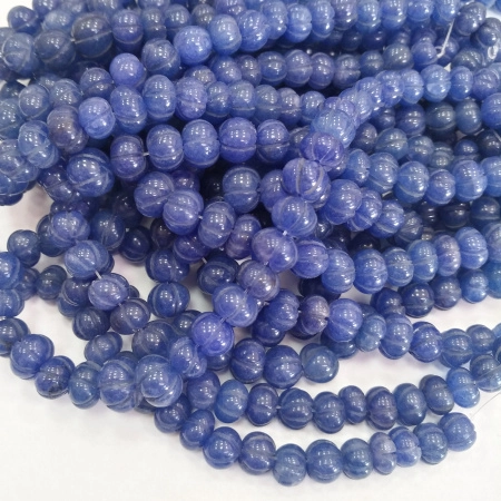 <p>Каменные бусины - фонарики ручной огранки (рондели с резным орнаментом). Натуральный сапфир поделочного качества. Оттенок может отличаться от фотографии. На бусинах возможны щербинки и трещинки естественного происхождения, отверстие может быть не ровным. Длина около 4-8 мм, ширина 6-11 мм. Цена за низку из 42 бусин.</p>