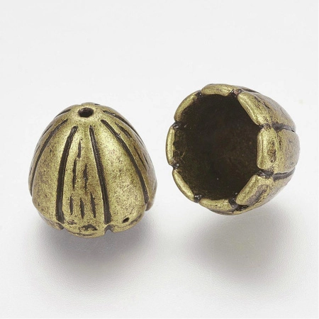 Конус, 10х9мм (внутренний размер 7мм), колокольчик, базовый материал - цинковый сплав, бронзового цвета с чернением, 1 шт. Конус, 10х9мм (внутренний размер 7мм), колокольчик, базовый материал - цинковый сплав, бронзового цвета с чернением, 1 шт.