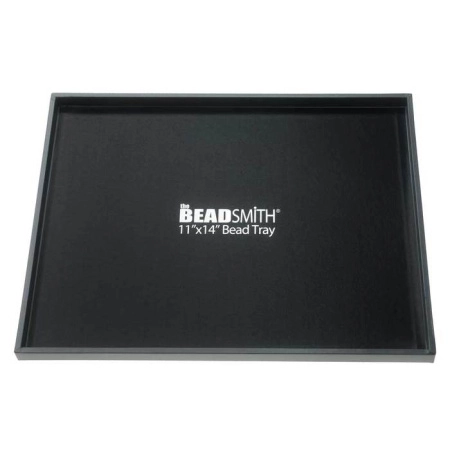 <p>Качественная подставка (лоток, поддон) BeadSmith Bead Tray для использования с ковриками для бисероплетения и сборки украшений. Легкий, но жесткий лоток с высокими бортиками позволит легко перемещать коврик в процессе работы, также с такой подставкой коврик можно использовать не только на столе, но и на коленях. В вес товара включен вес упаковки. Доставка почтой по предоплате. Цена за 1 поддон.</p>
