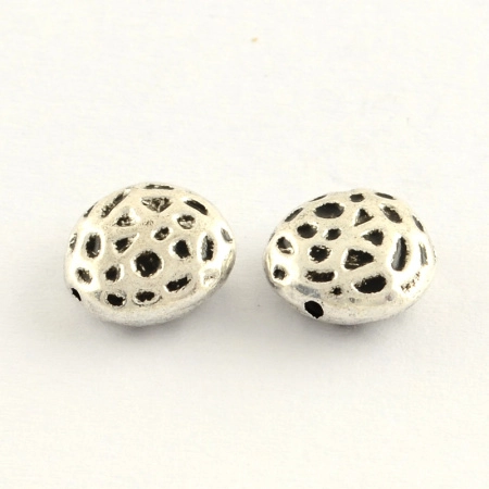 <p>
 Плоская двусторонняя бусина неправильной формы с леопардовым узором. Изготовлена из бижутерного сплава с серебристым покрытием (стиль тибетское серебро). Размер отверстия: около 1 мм. Цена за 20 шт.
</p>