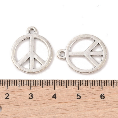 <p>Двусторонняя подвеска из тибетского серебра в форме пацифистского знака (peace symbol). На фотографии показана лицевая и тыльная стороны. На подвесках данной партии возможны небольшие неровности на покрытии, пятнышки. Базовый материал - бижутерный металлический сплав, покрытие серебристое с чернением. Оттенок может отличаться от фотографии и в разных поставках. Цена за 10 шт.</p>