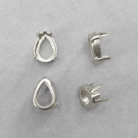 Оправа с цапами, 14х10мм, пришивная, форма капля, базовый материал - латунь, стального цвета, 10 шт. Оправа с цапами, 14х10мм, пришивная, форма капля, базовый материал - латунь, стального цвета, 10 шт.