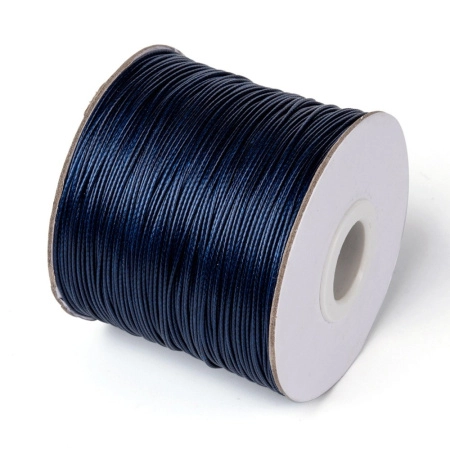 <p>Тонкий плетеный вощеный синтетический (полиэстеровый) шнур, цвет тёмно-синий. Толщина может немного отличаться от заявленной. К этому шнуру лучше брать концевики с внутренним диаметром 0.9-1 мм - в меньший концевик шнур может быть сложно вставить из-за распушенного кончика. Оттенок может отличаться от фотографии. По возможности, продается цельным куском, однако, может поставляться несколькими отрезами. Цена за 10 метров. </p>