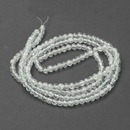 <p>Стеклянные бусины с эффектом кракелюра. Гладкие шарики кракле (с трещинками внутри). Цвет кристально-прозрачный с небольшим желтоватым отливом, напоминают снежный кварц. Оттенок может отличаться от фотографии и в разных поставках. Возможны небольшие потертости возле отверстий. Бусины могут незначительно отличаться по размеру и форме. Длина низки около 80 см, в низке около 185 бусин. Цена за одну низку.</p>