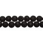 <p>Бусины из натуральной вулканической лавы (вулканического туфа), тонированной в черный цвет. Оттенок может отличаться от фотографии и в разных поставках. Диаметр отверстия около 1 мм. Могут немного отличаться по форме и размеру. Цена за низку длиной примерно 37-38 см, около 36 бусин (низки формируются без проверки каждой бусины на дефекты).</p>