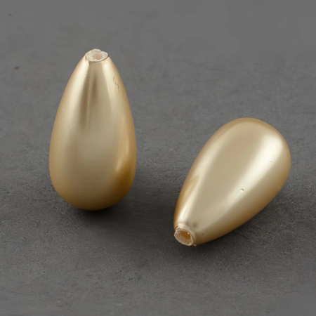 <p>
Полупросверленная бусина капля из ракушки с покрытием под жемчуг Майорка (Майолика). Длина бусины - около 16 мм, ширина нижней части - около 8 мм. Диаметр отверстия - около 1 мм. Рекомендуется использовать с вклеивающимися штифтами. Бусины могут немного отличаться по форме и размеру. Цена за 2 шт.
</p><p>ВНИМАНИЕ: на покрытии возможны небольшие царапинки и вмятинки.</p>