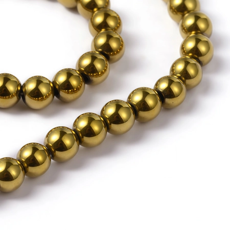 Бусины каменные, гематит, металлизированный, золотой, 4мм, 98 шт., низка <p>Низка бусин из окрашенного (металлизированного) гематита, цвет золотистый. Бусины могут немного отличаться по форме и размеру. Оттенок может отличаться от фотографии и от партии к партии. Гематит создан искусственно, по составу аналогичен натуральному. В низке около 98 бусин. Низки формируются без проверки каждой бусины на дефекты. Цена за низку.</p>