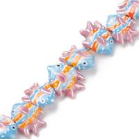 Бусина фарфоровая, 25х20х10-20х16х5мм, тропическая рыбка, сиренево-голубая с оранжевым, 1 шт.