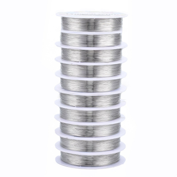 <p>Медная проволока с покрытием под серебро. Оттенок может отличаться от фотографии. Намотка может состоять из нескольких частей. Цена за катушку около 25 метров.</p>