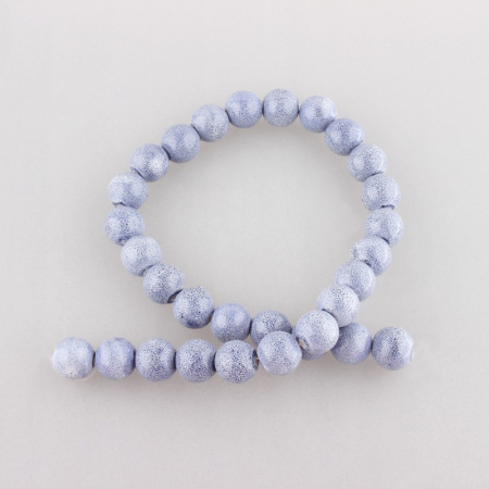 <p>
Керамическая бусина - шарик ручной работы. Бусина покрыта глазурью белого цвета с синими точками. Бусины могут немного отличаться по форме и размеру, рисунок на каждой бусине уникален. Диаметр отверстия - около 2 мм. Цена за 1 бусину.
</p>