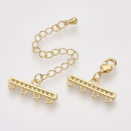 <p>Элитная ювелирная фурнитура премиум класса - Милано люкс (Milano Lux), качественный элемент для создания бижутерии. Набор для окончания многорядного украшения или широкого плетёного браслета/колье. В набор входят 2 соединителя-переходника с 4 на 1 нить размером 22*8 мм, инкрустированных кристально-прозрачными стразами - фианитами (Cubic Zirconia – кубик циркония, CZ, цирконы). К одному концевику прикреплена застежка карабин (лобстер), к другому - цепочка-удлинитель длиной около 5 см. и декоративной капелькой на конце. В застёгнутом виде длина концевиком вместе с замочком (без учёта удлинителя) составляет около 28 мм. Базовый материал латунь, покрытие - позолота (гальваническое напыление золотом 18К). Оттенок может отличаться от фотографии и в разных поставках. При желании концевики можно отсоединить и использовать как коннекторы или подвески. Цена за 1 набор.</p>