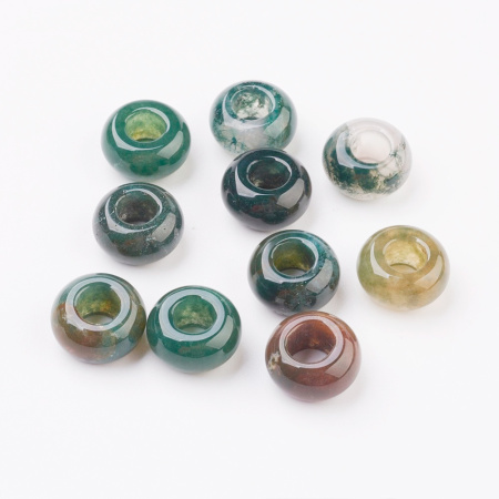 <p>Бусины - рондели с крупным отверстием (абакусы, диски) из натурального камня - индийского агата. Диаметр отверстия около 6 мм. Эти бусины отлично подходят для браслетов в стиле Пандора, а также для сборки украшений с кожаными шнурами. Бусины могут немного отличаться по форме и размеру. Оттенок может существенно отличаться от фотографии: преобладают бусины в зеленых тонах, также попадаются бусины других цветов (бордовые, сиреневые, коричневые, серые и т.д.). Цена за 1 бусину.</p>