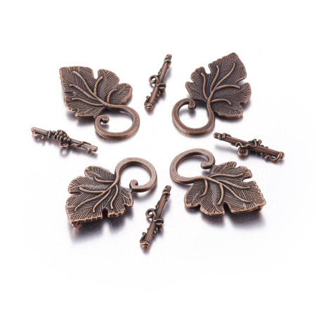 <p>Крупная эффектная застежка-тогл в форме виноградного листа с гроздью ягод винограда. Под античную медь. Оттенок может отличаться от фотографии. Цена за 5 шт.</p>