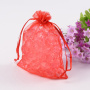 <p>Подарочный мешочек из алой органзы с красной ленточкой для завязывания, оттенок может отличаться от фотографии. Мешочки могут немного отличаться по форме и размеру, быть слегка помятыми. Оттенок может отличаться от фотографии и в разных поставках. Цена за 10 шт.</p>
