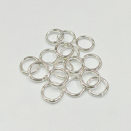 Соединительное колечко, 7мм (толщина 1.0мм, внутренний размер 5мм), неразъемное, базовый материал - латунь, серебристого цвета, 2 грамма