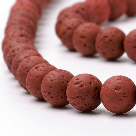 <p>Бусины из натуральной вулканической лавы (вулканического туфа), тонированной в красновато-коричневый цвет. Оттенок может отличаться от фотографии. Бусины матовые. Могут немного отличаться по форме и размеру. Бусины могут быть покрыты пылью от сверления, рекомендуется их протереть или промыть перед использованием. Низки формируются без проверки каждой бусины на дефекты. Цена за низку, около 37 бусин.</p>