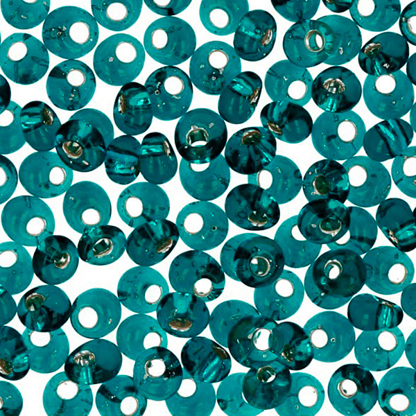 <p>Японский бисер TOHO Magatama (приплюснутый каплеобразный бисер Тохо со смещенным отверстием), размер 3мм. Прозрачный зелено-голубой с серебристой сердцевиной (Silver-Lined Teal). Оттенок может отличаться от фотографии. Среднее количество бисерин в 1 грамме Toho Магатама 3 мм - около 35 штук, может сильно варьироваться в зависимости от цвета бисера. Цена за 10 грамм.</p>