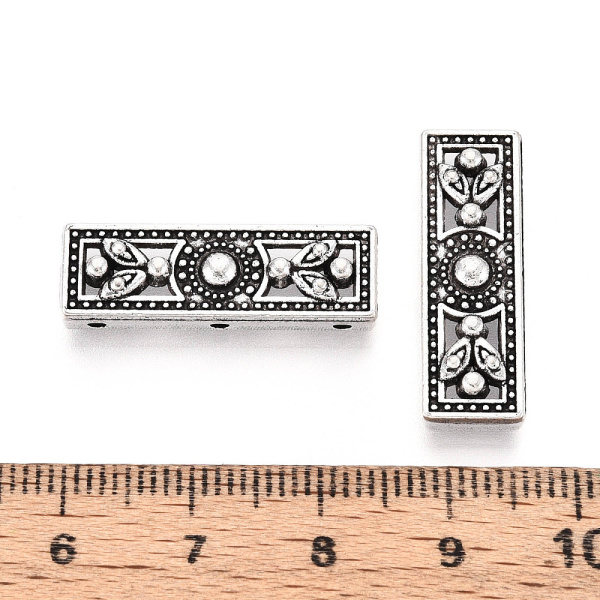 <p>
Разделитель-планка для многорядных браслетов или колье. На три отверстия, односторонний. Разделитель подходит для бусин до 10 мм включительно (расстояние между отверстиями составляет около 10 мм). Стиль "тибетское серебро". Оттенок может отличаться от фотографии и в разных поставках. Цена за 10 шт.
</p>